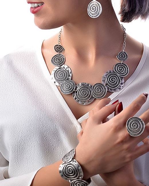 Silvertone Swirl Disc Status Jewelry Set
