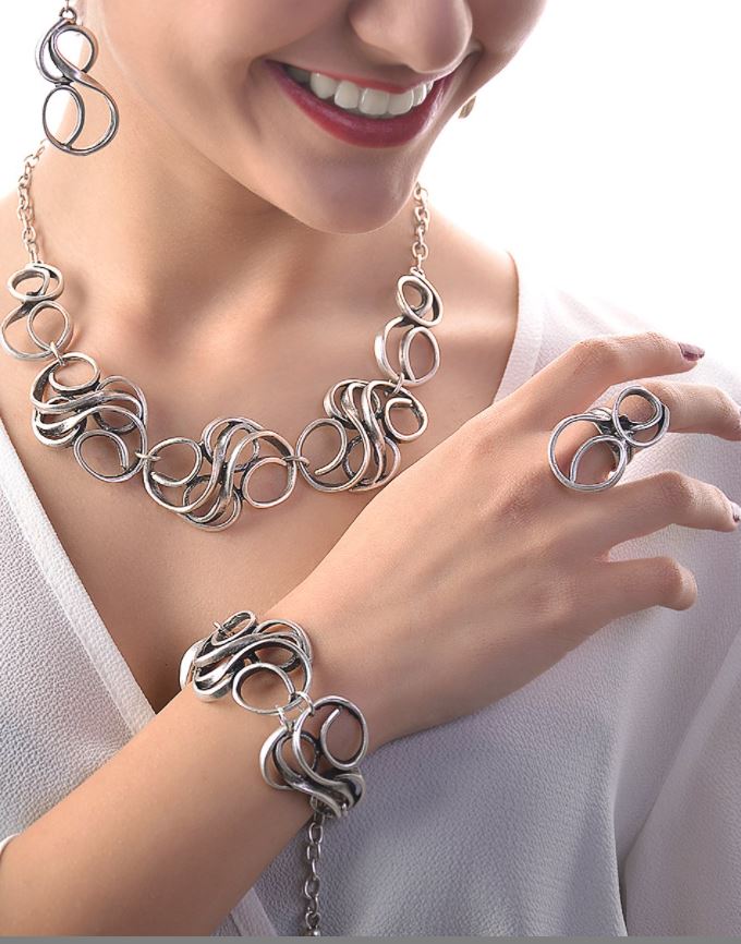 Silvertone Loops Status Jewelry Set